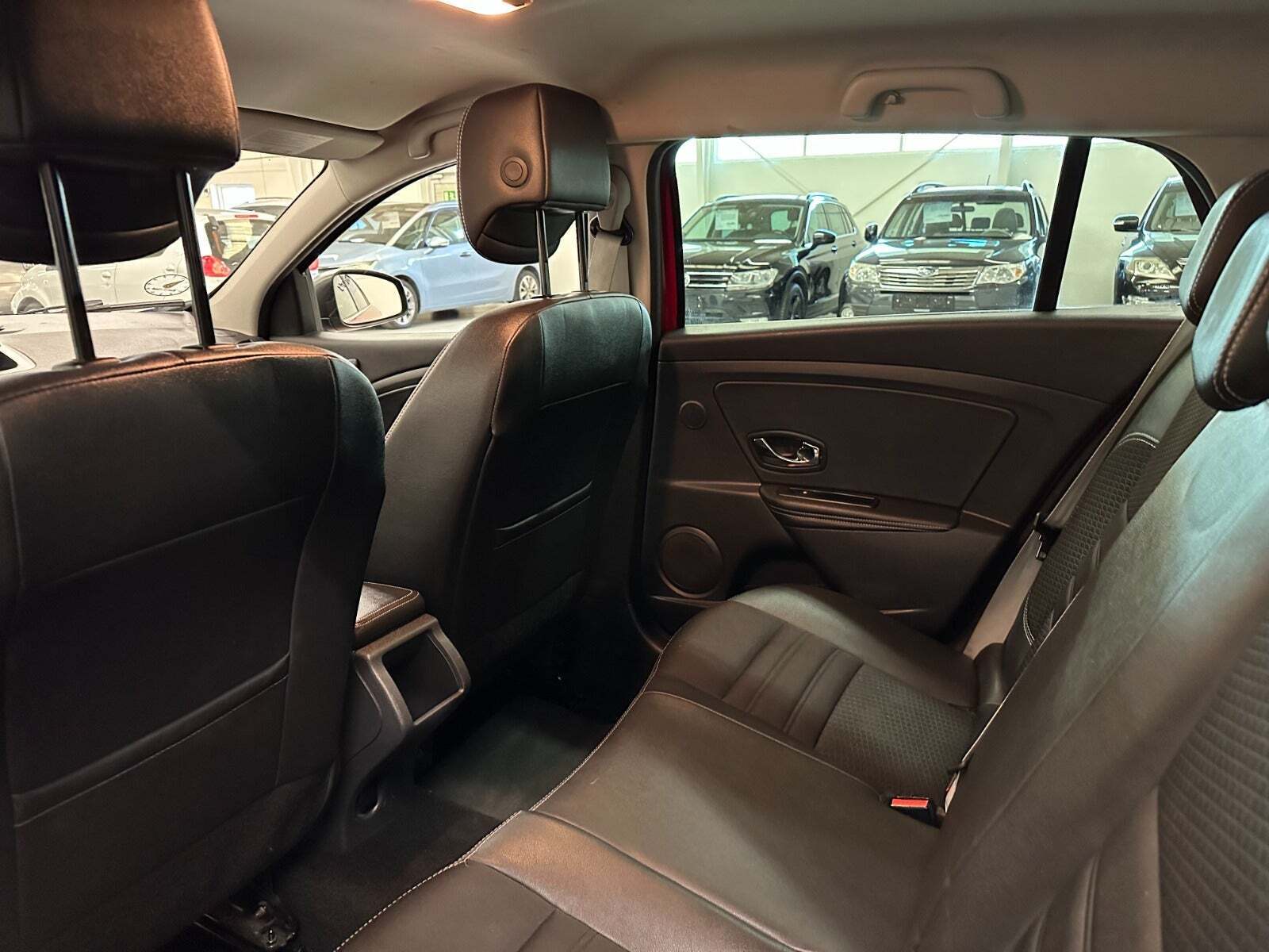 Rød Renault Megane III fra 2014