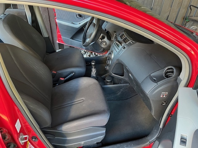 Rød Toyota Yaris fra 2009