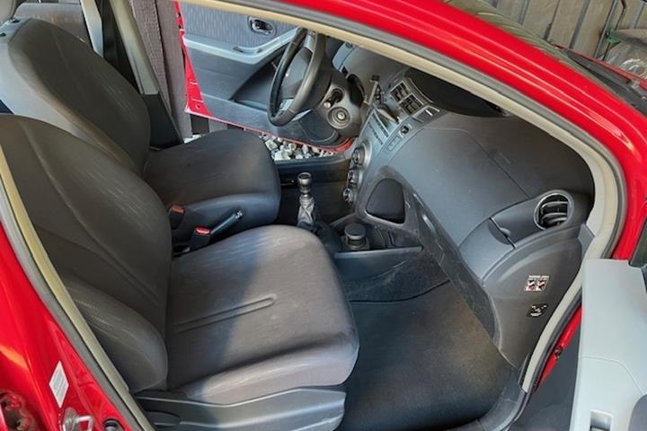 Rød Toyota Yaris fra 2009