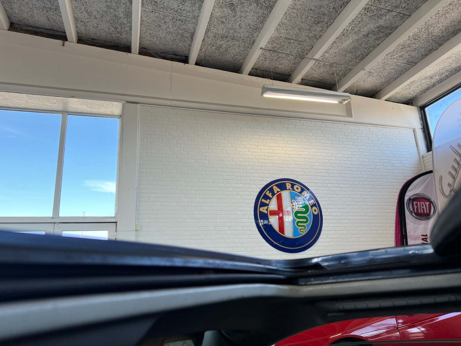 Blå Alfa Romeo GTV fra 1999 set udefra