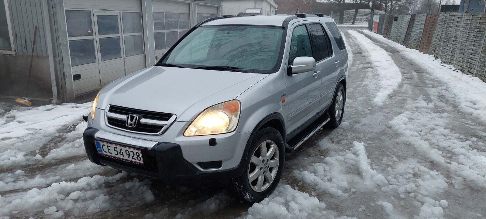 Sølv Honda CR-V fra 2003