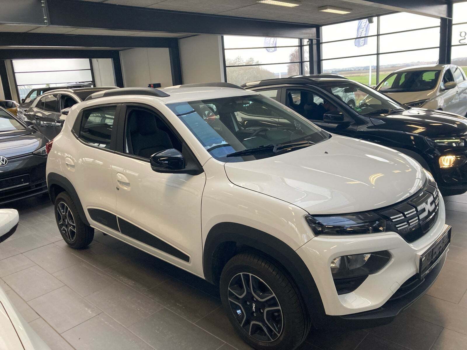 Hvid Dacia Spring fra 2023