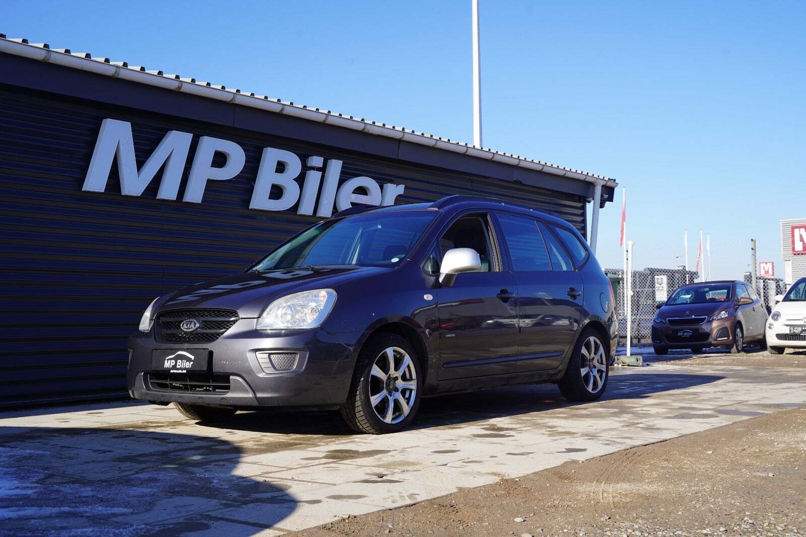 Grå Kia Carens fra 2007