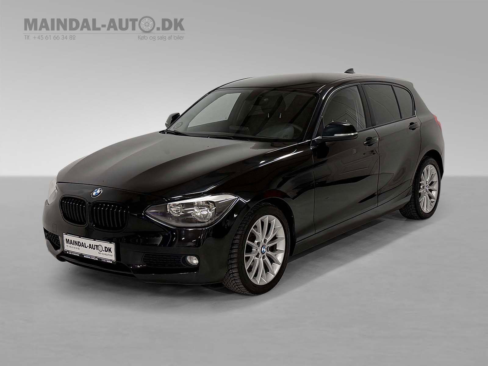 Sort BMW 118d fra 2013 set udefra