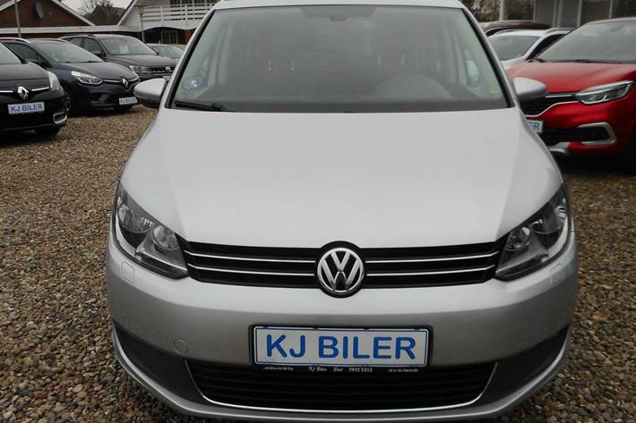 Sølv VW Touran fra 2014