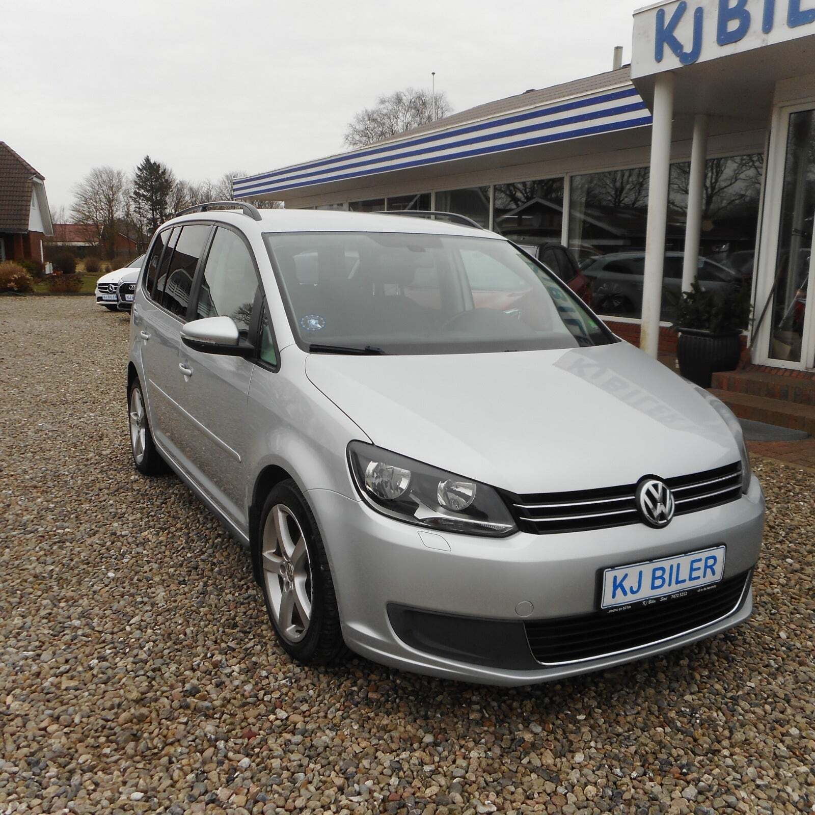 Sølv VW Touran fra 2014