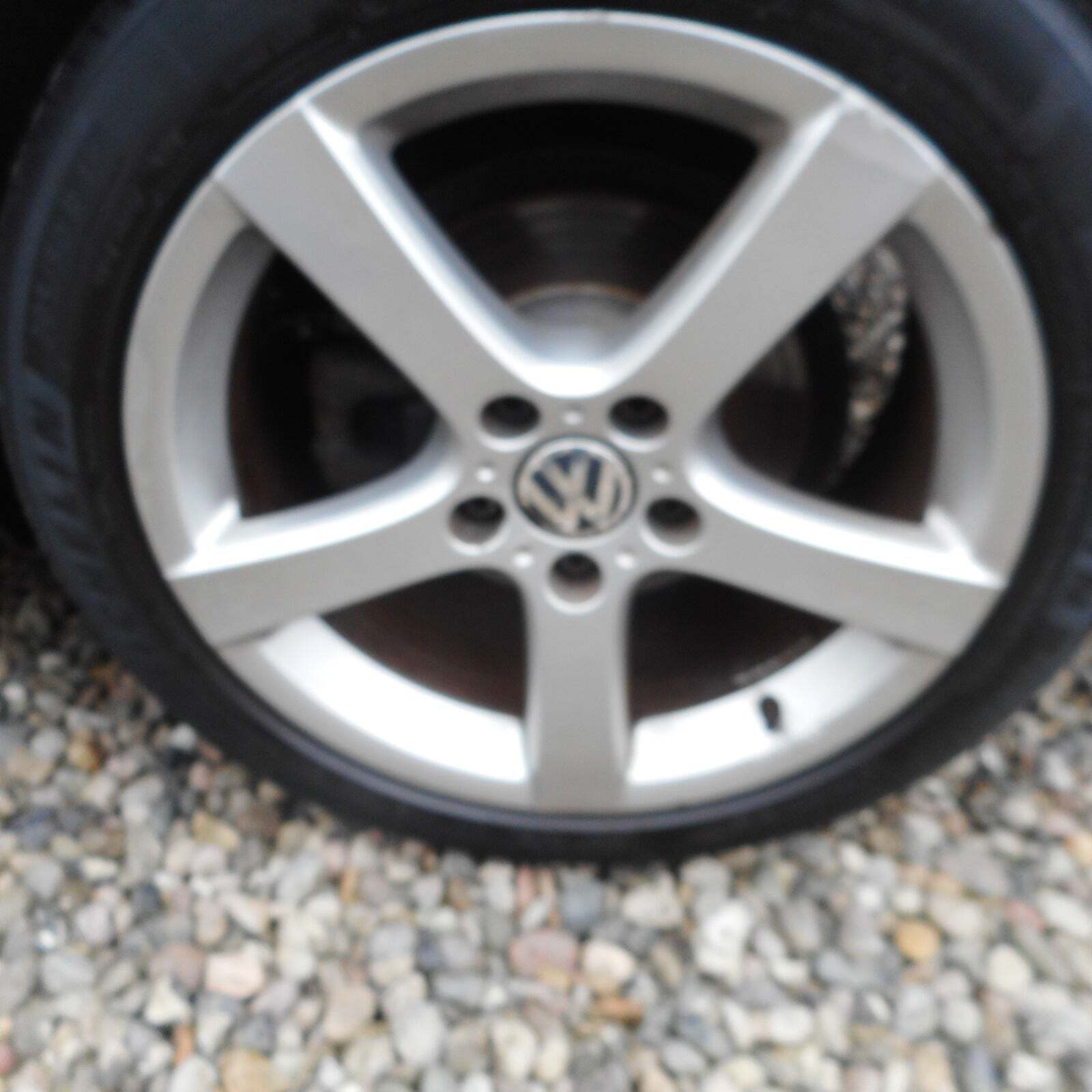 Sølv VW Touran fra 2014