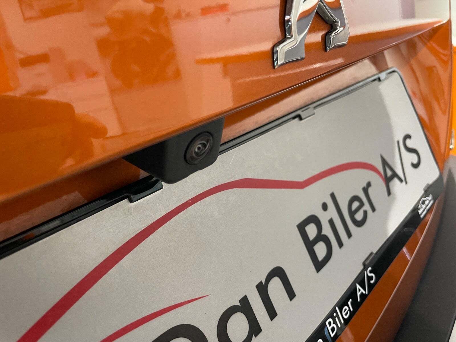 Orange Peugeot e-2008 fra 2023