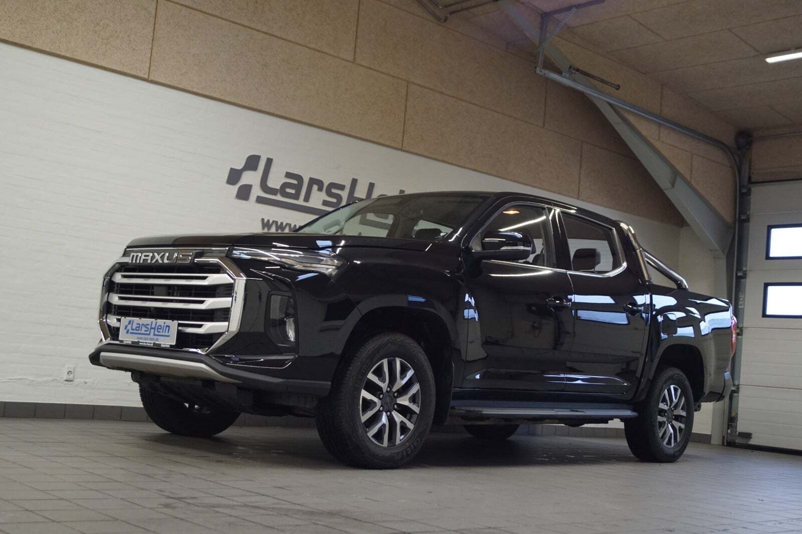 Sort Maxus eT90 fra 2024 set udefra