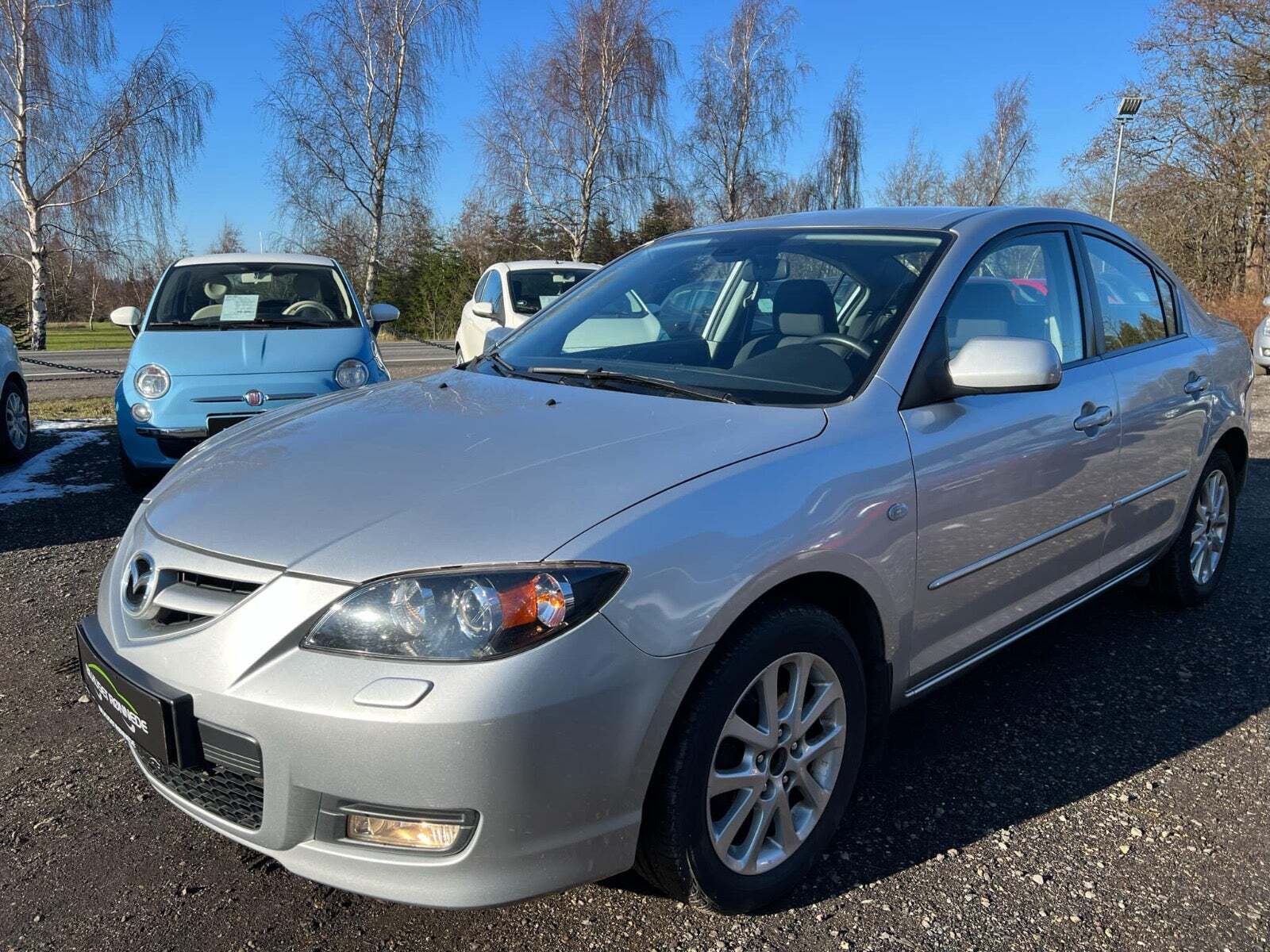 Sølv Mazda 3 fra 2009