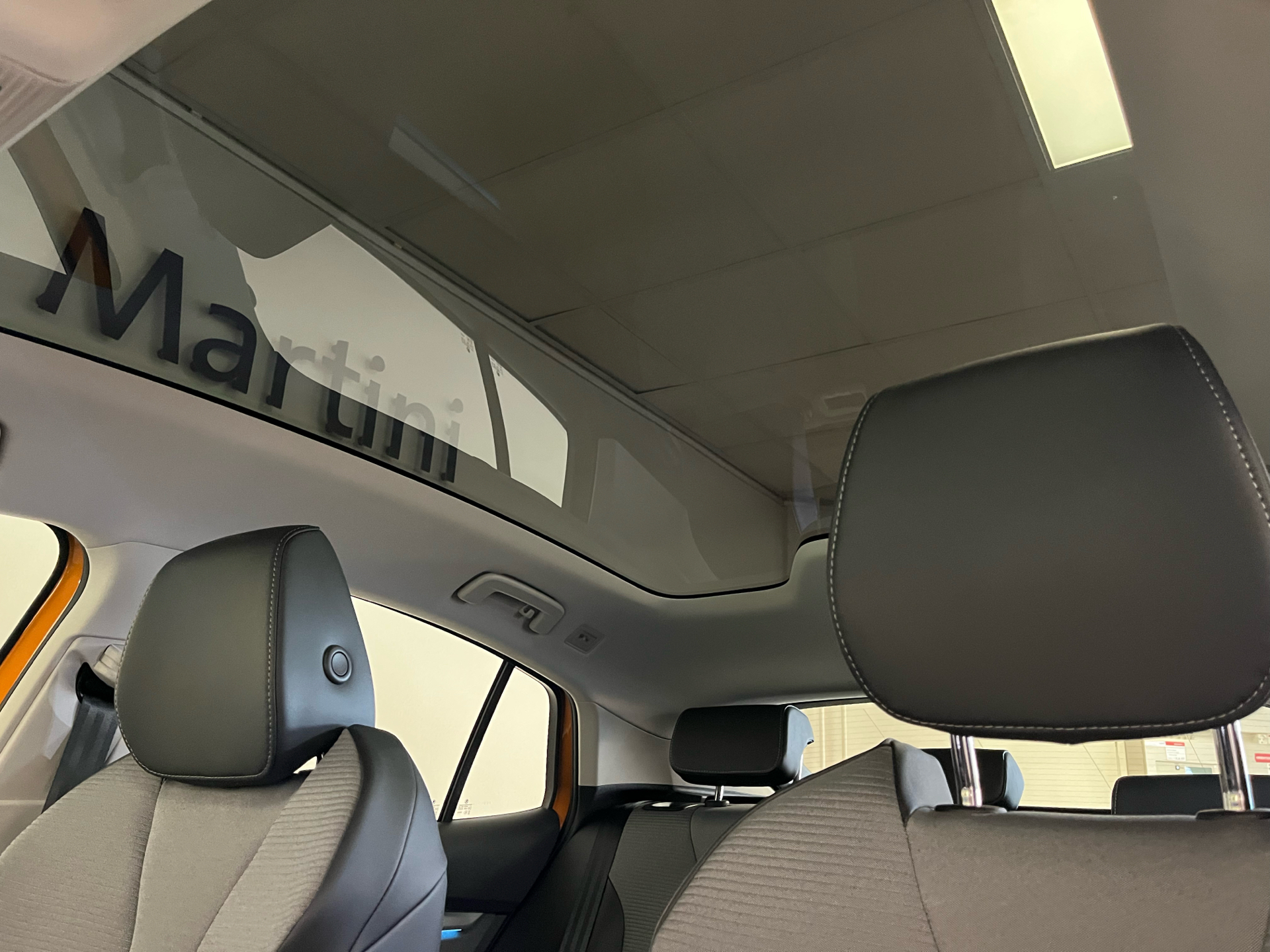 Orange Skoda Enyaq iV fra 2023