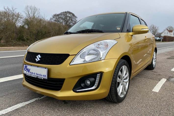 Gul Suzuki Swift fra 2016 set udefra