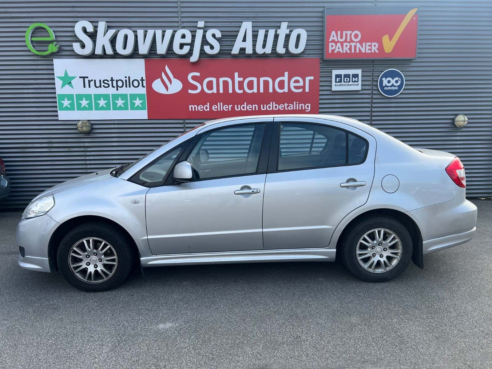 Sølv Suzuki SX4 fra 2010