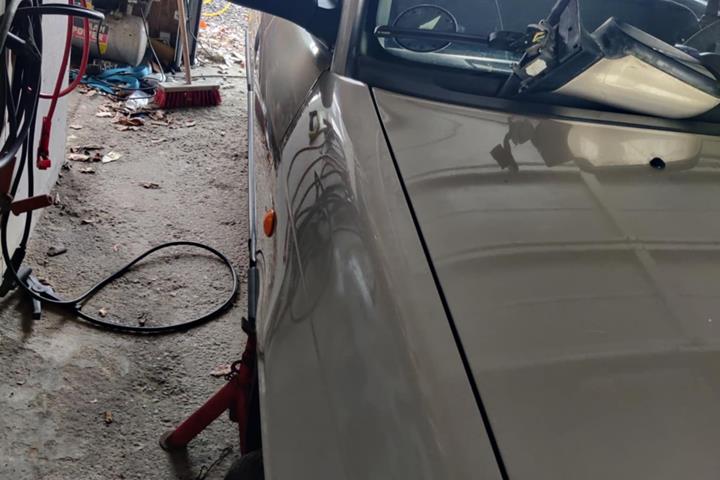 Beige Opel Astra fra 1997