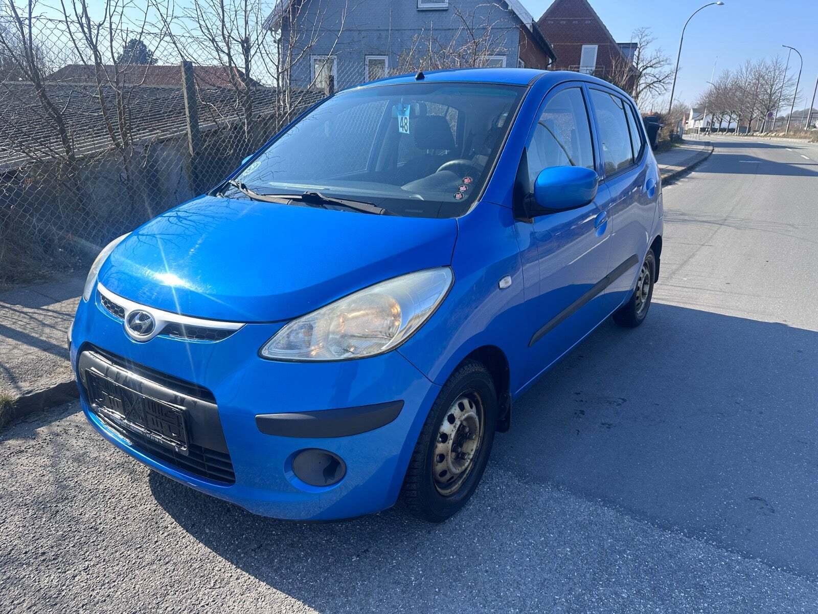 Grøn Hyundai i10 fra 2010 set udefra