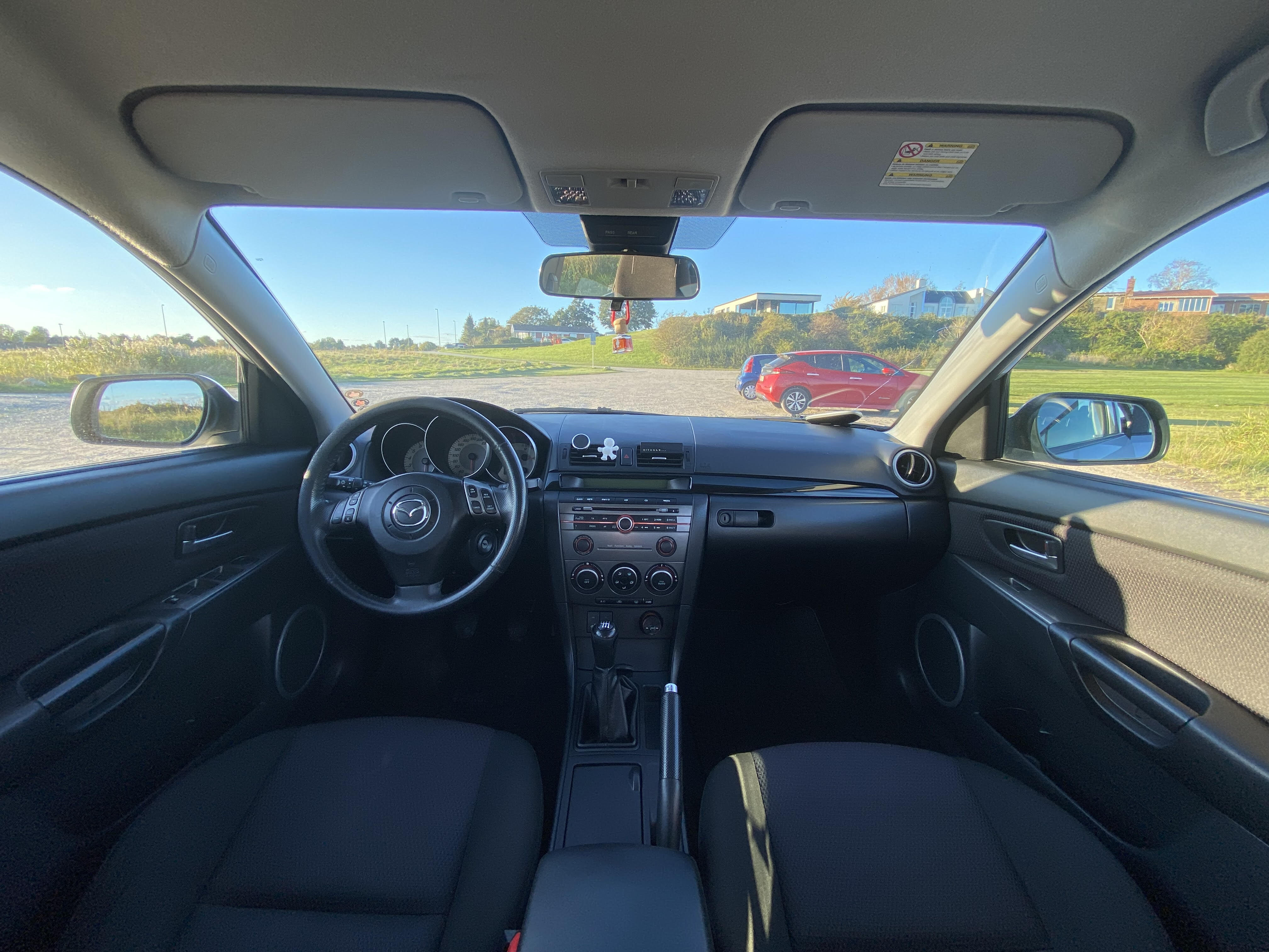 Sølv Mazda 3 fra 2008