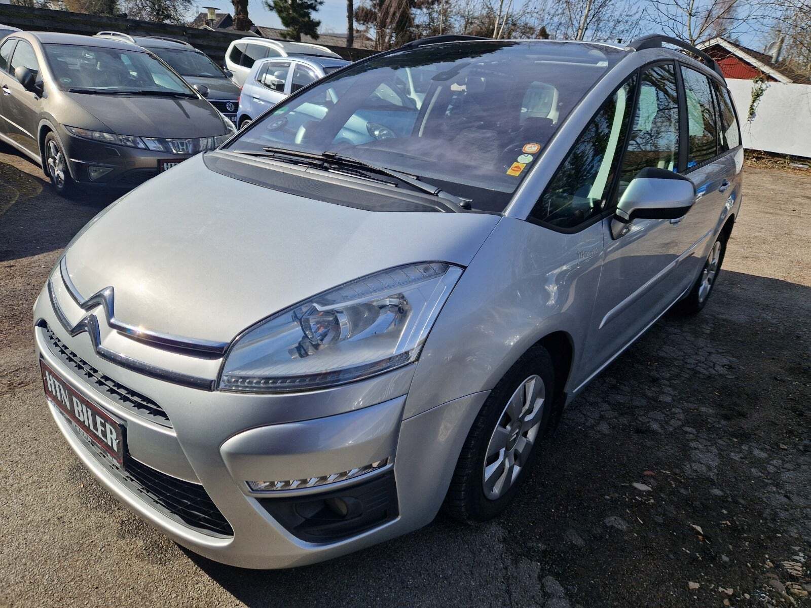 Sølv Citroën Grand C4 Picasso fra 2012 set udefra