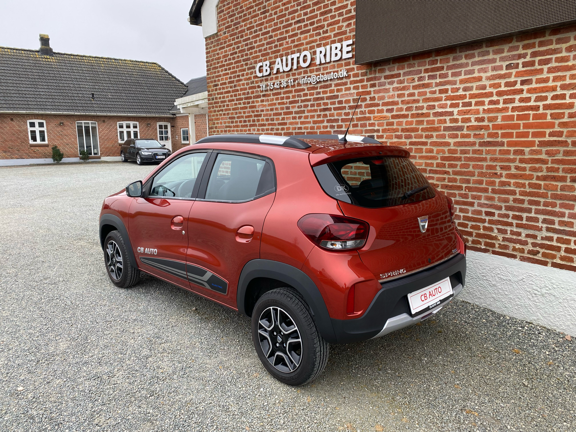 Rød Dacia Spring fra 2023