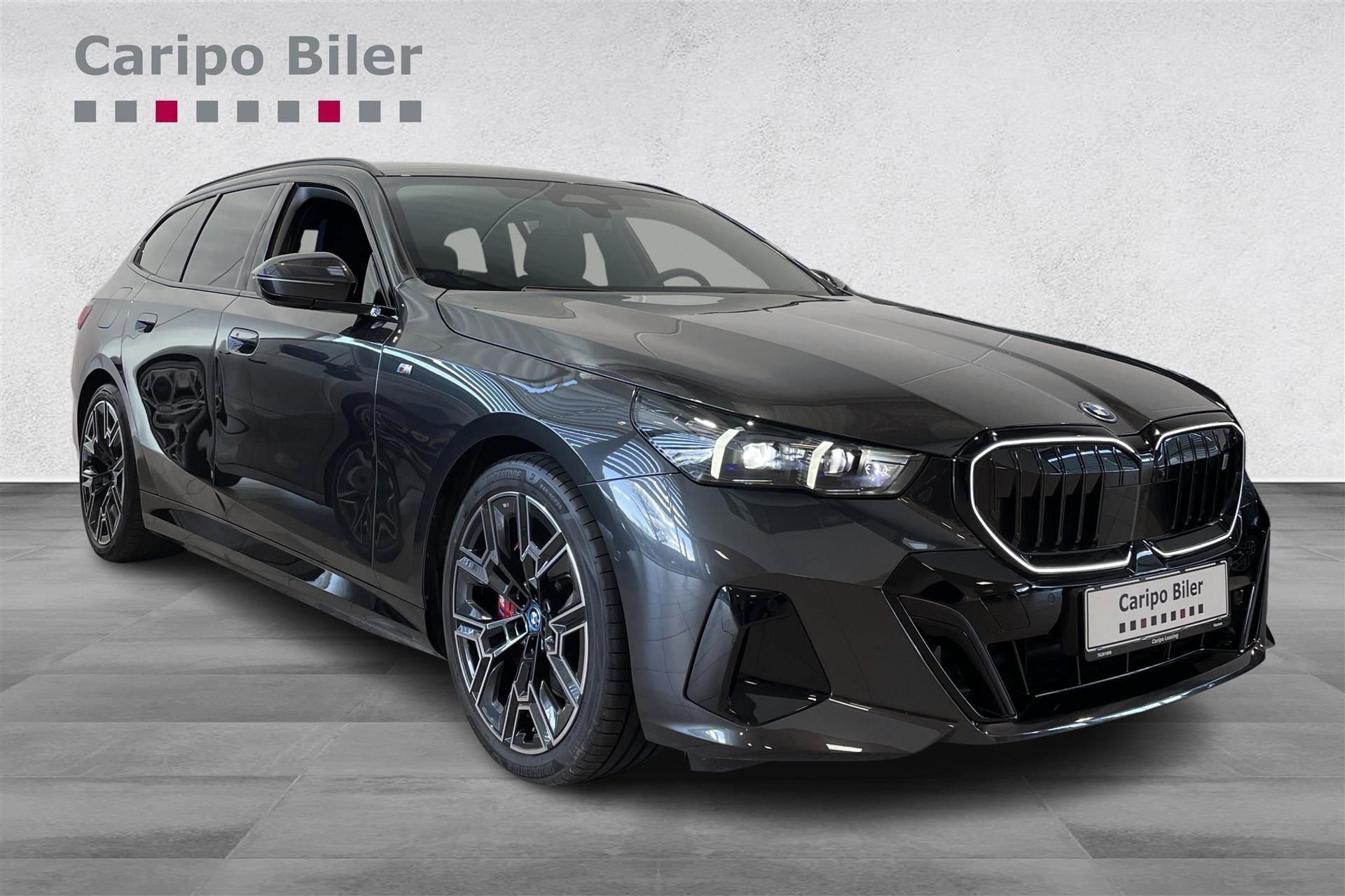 Grå BMW i5 fra 2024