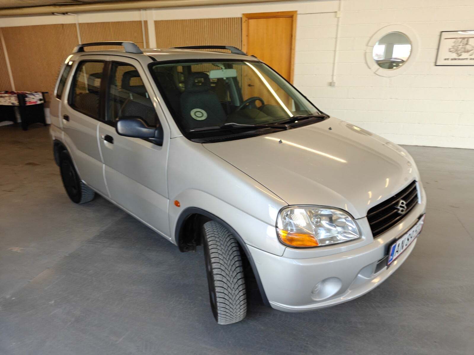 Gul Suzuki Ignis fra 2002