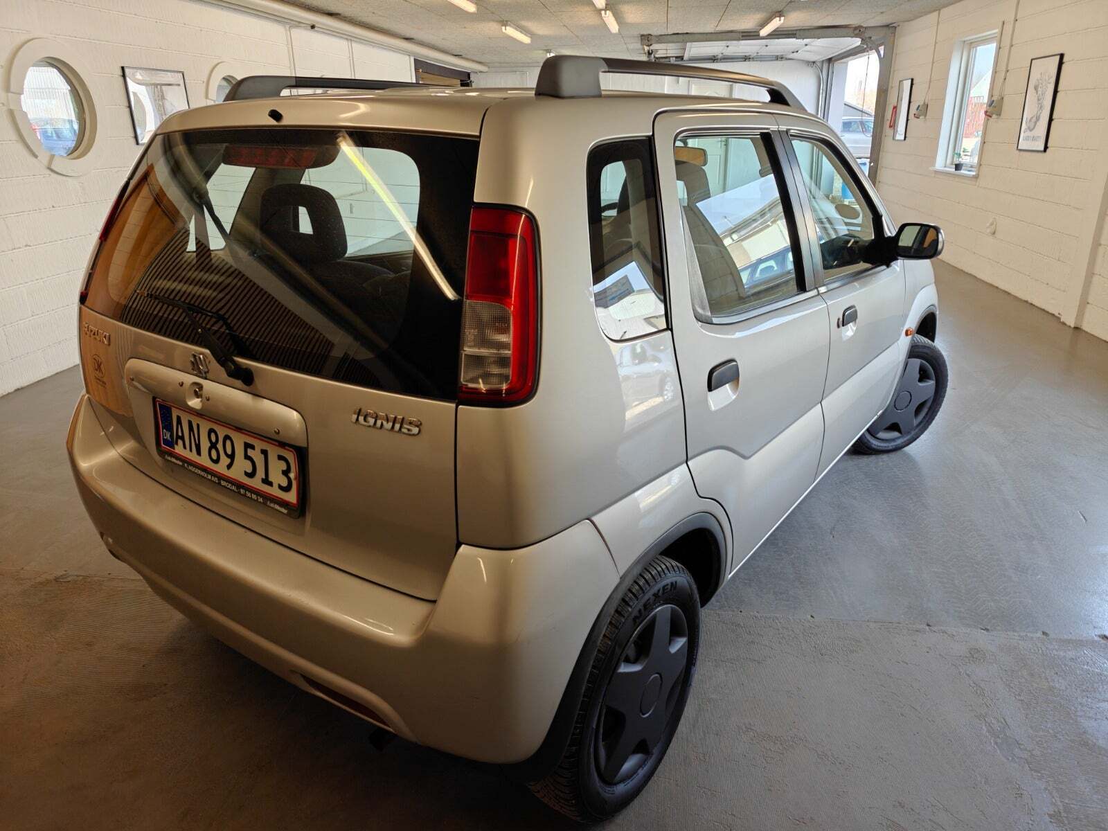 Gul Suzuki Ignis fra 2002