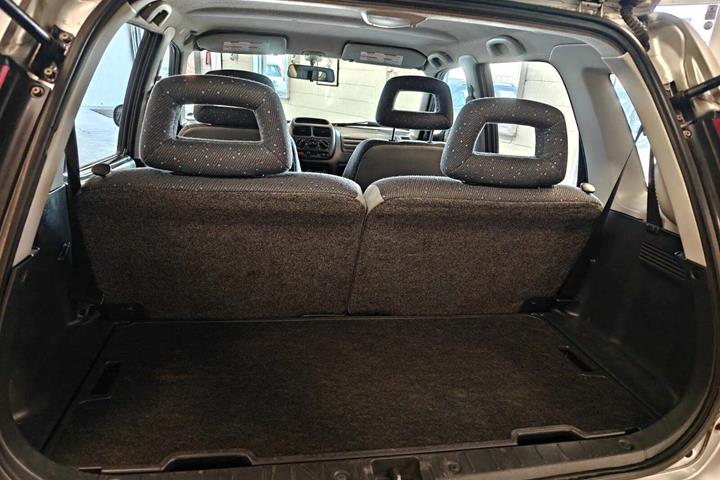 Gul Suzuki Ignis fra 2002