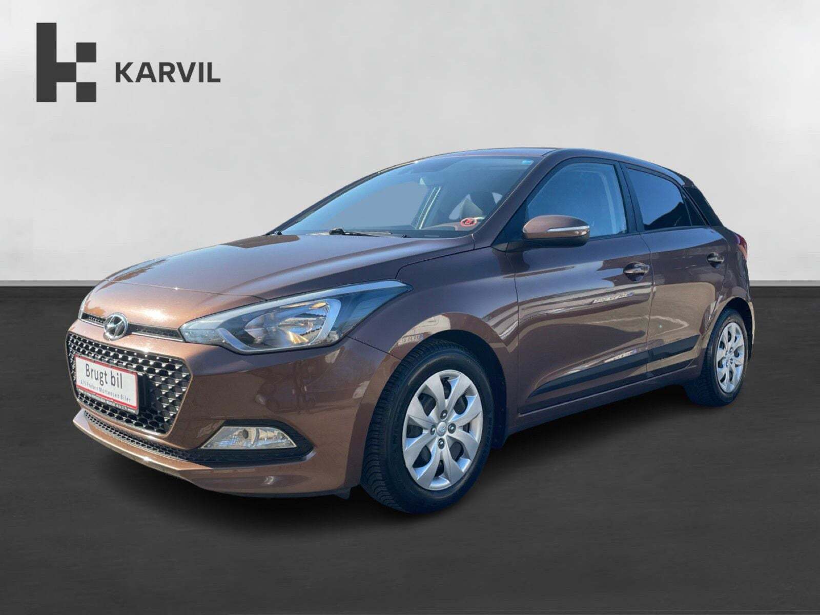 Brun Hyundai i20 fra 2015 set udefra