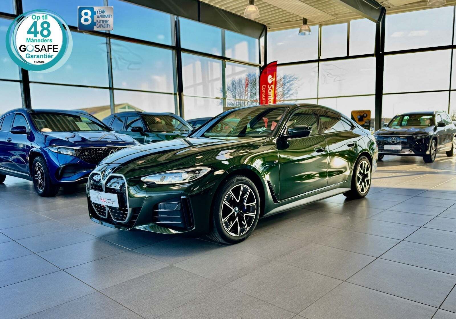 Grøn BMW i4 fra 2024 set udefra