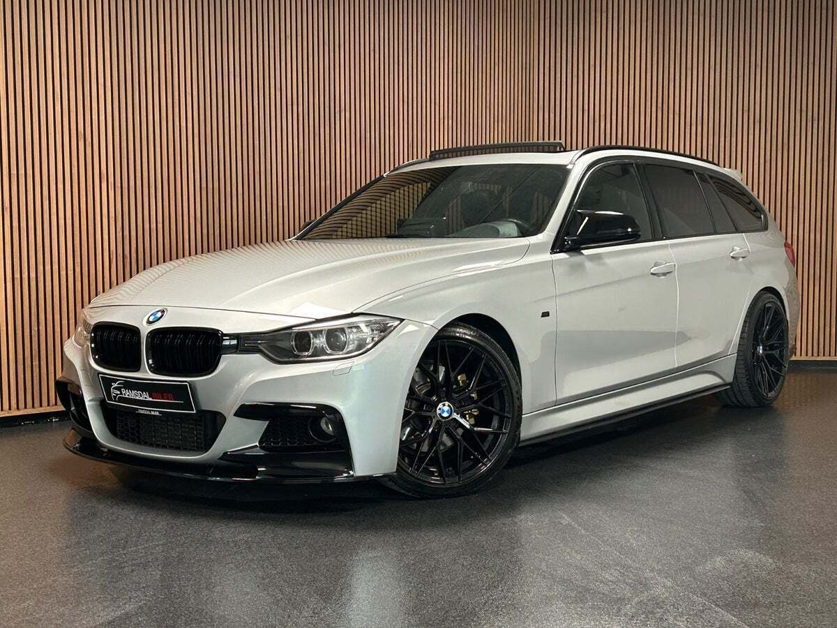 Sølv BMW 328i fra 2014 set udefra