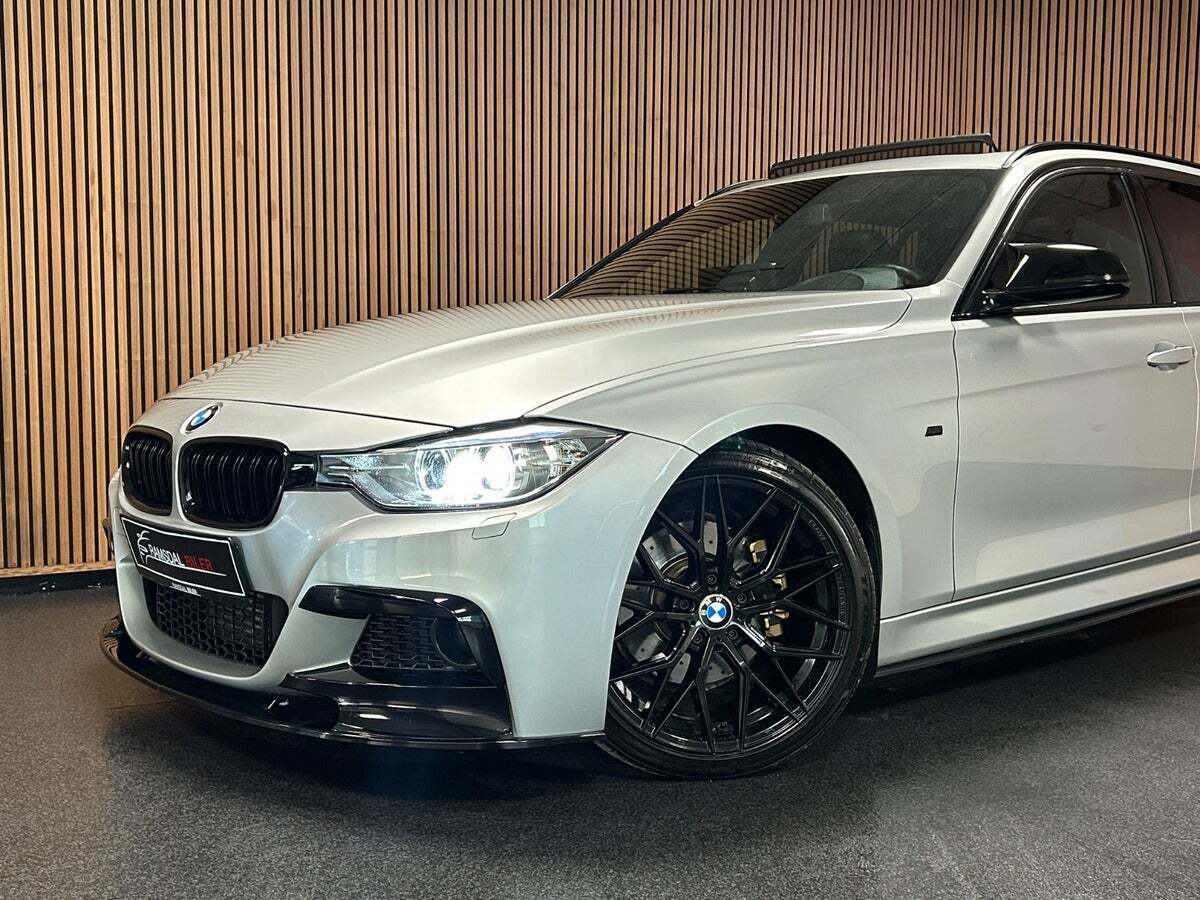 Sølv BMW 328i fra 2014