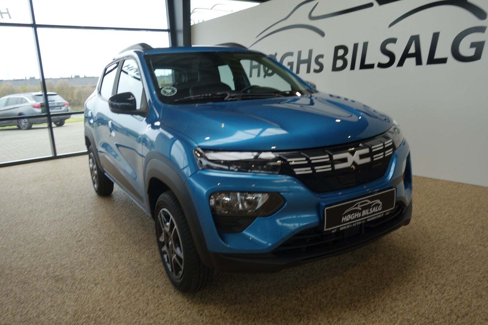 Blå Dacia Spring fra 2023