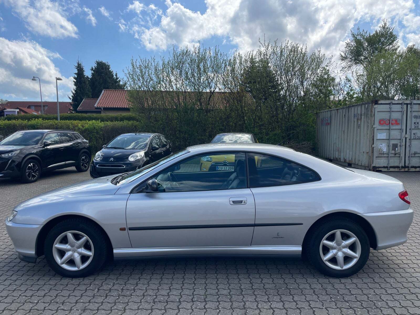 Sølv Peugeot 406 fra 1998