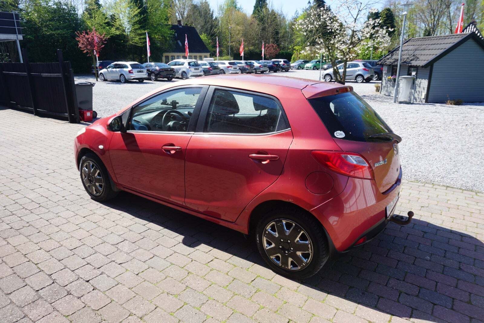 Rød Mazda 2 fra 2007