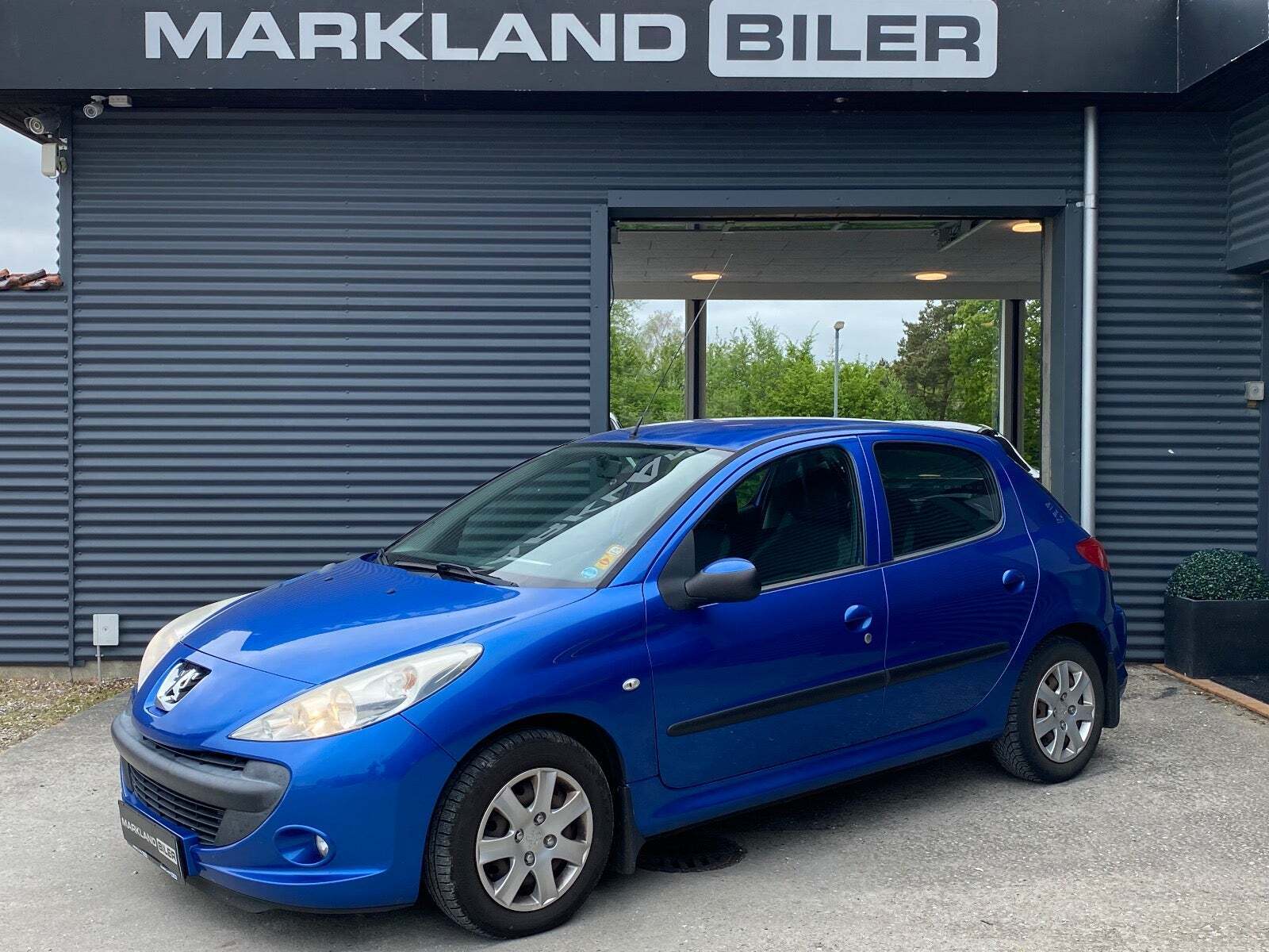 Blå Peugeot 206+ fra 2012 set udefra
