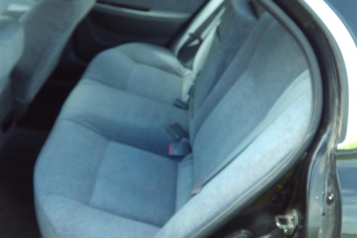 Sort Kia Magentis fra 2003