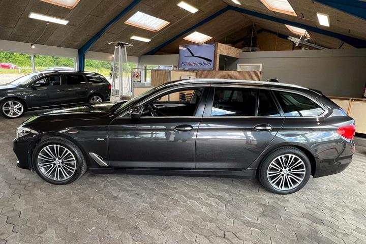 Grå BMW 520d fra 2018