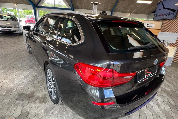 Grå BMW 520d fra 2018