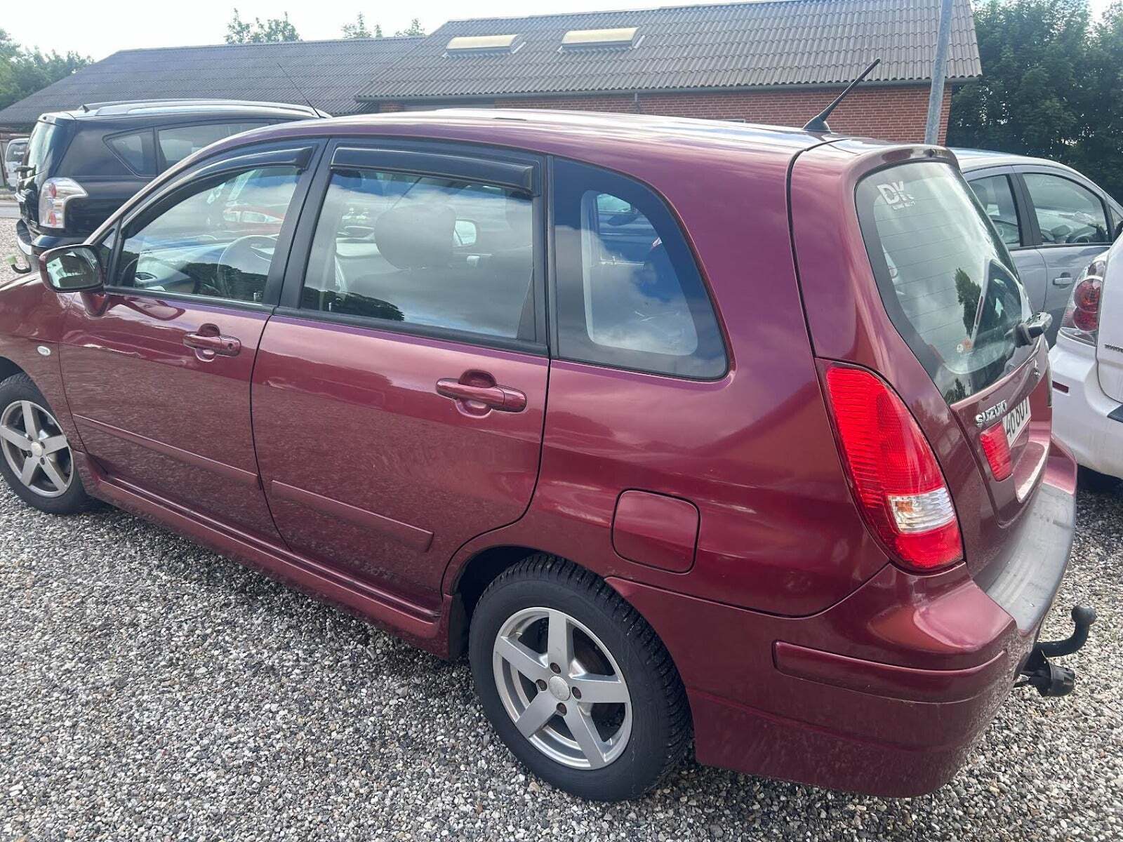 Grå Suzuki Liana fra 2004