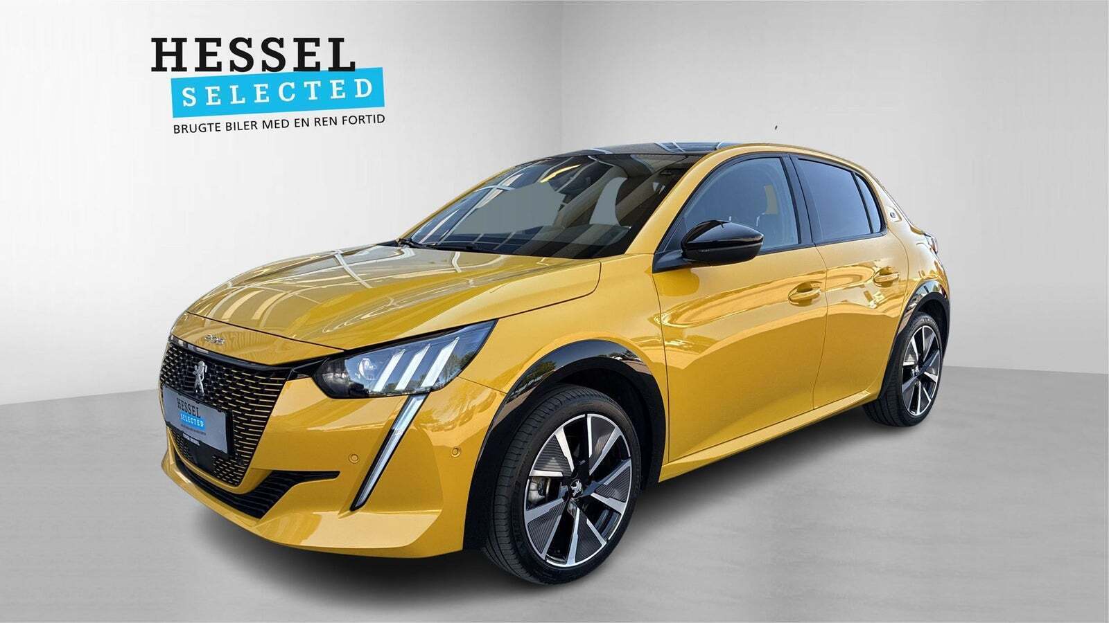 Gul Peugeot e-208 fra 2022 set udefra