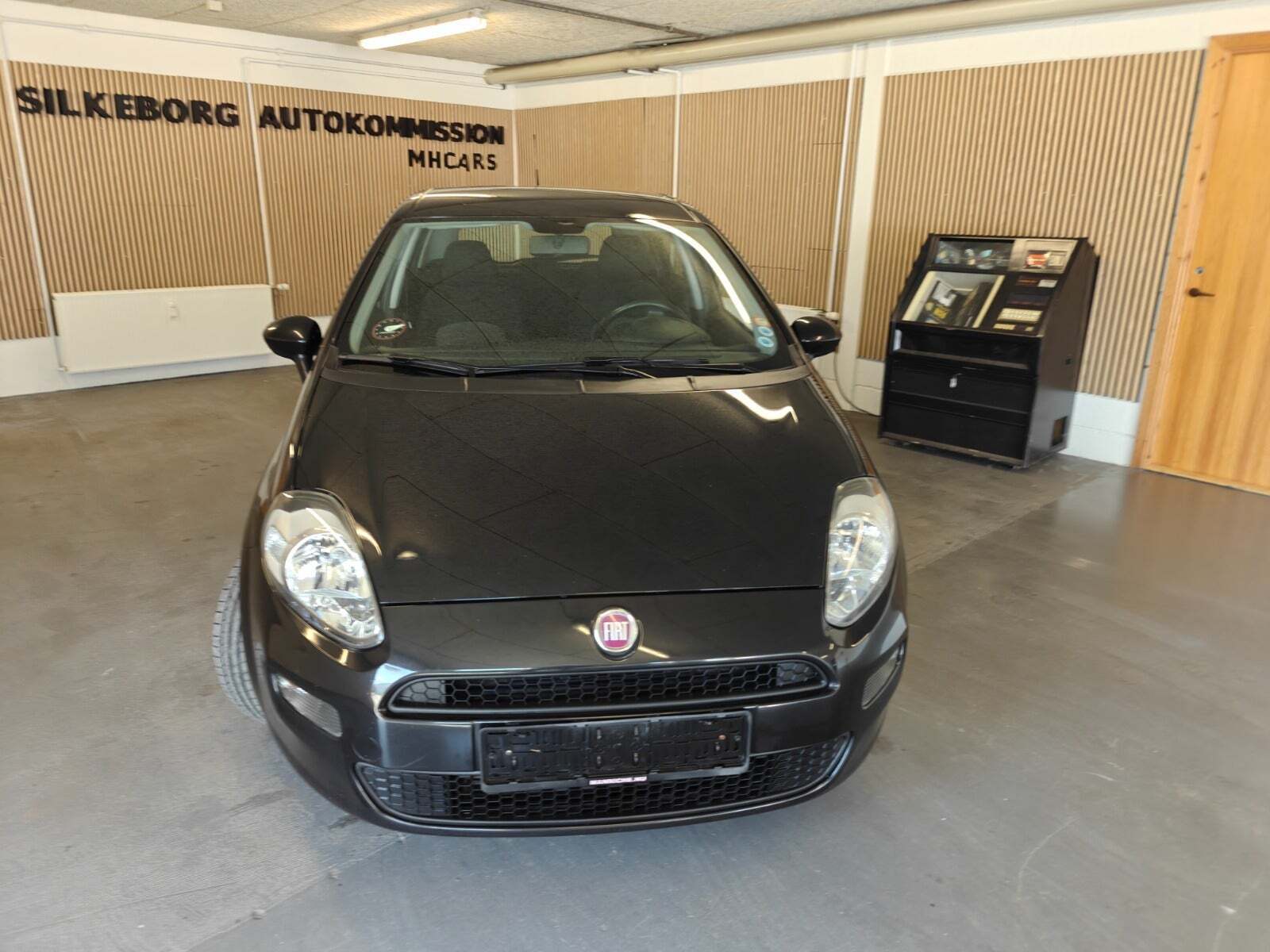 Gul Fiat Punto fra 2014