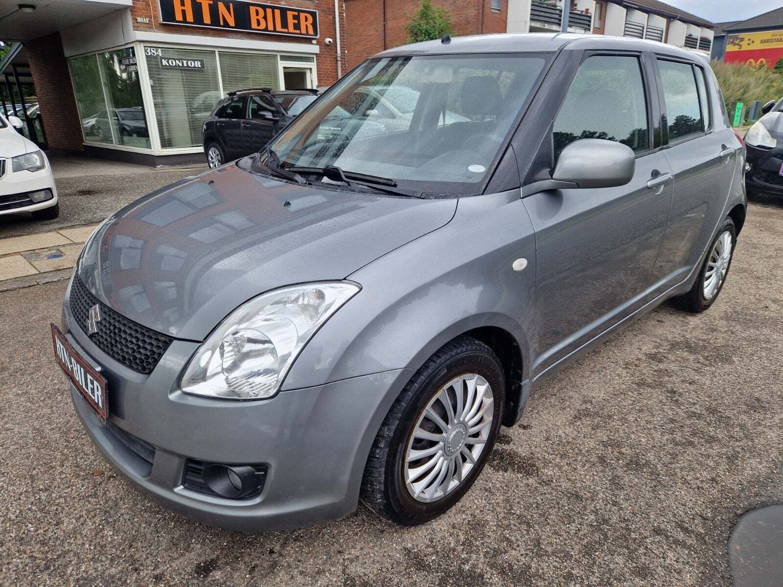 Grå Suzuki Swift fra 2009