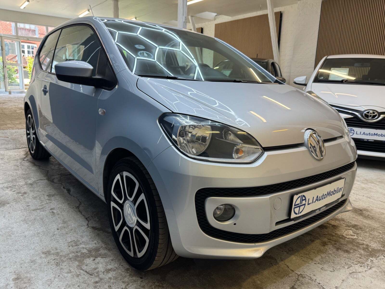 Sølv VW UP! fra 2013