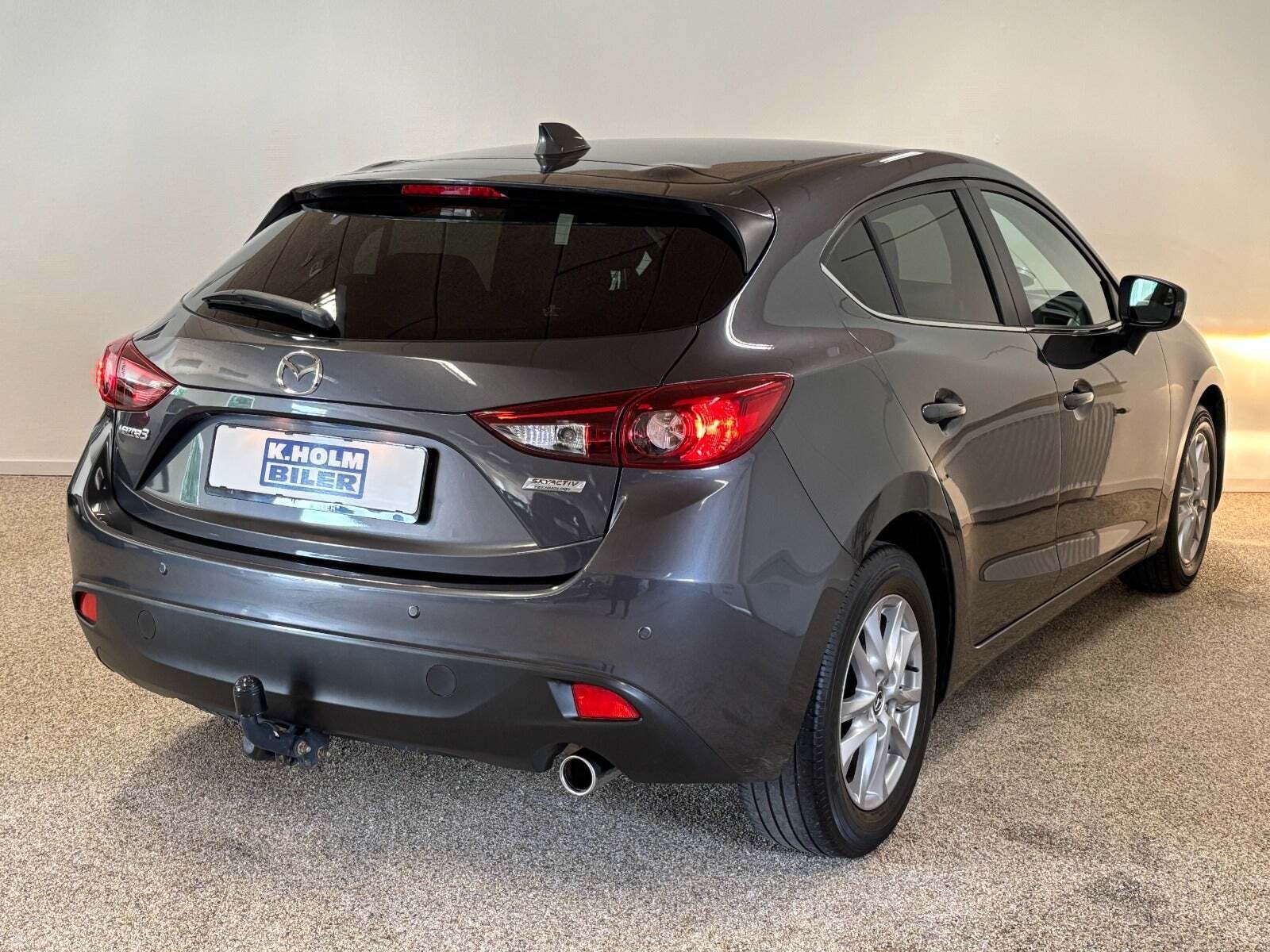 Grå Mazda 3 fra 2014