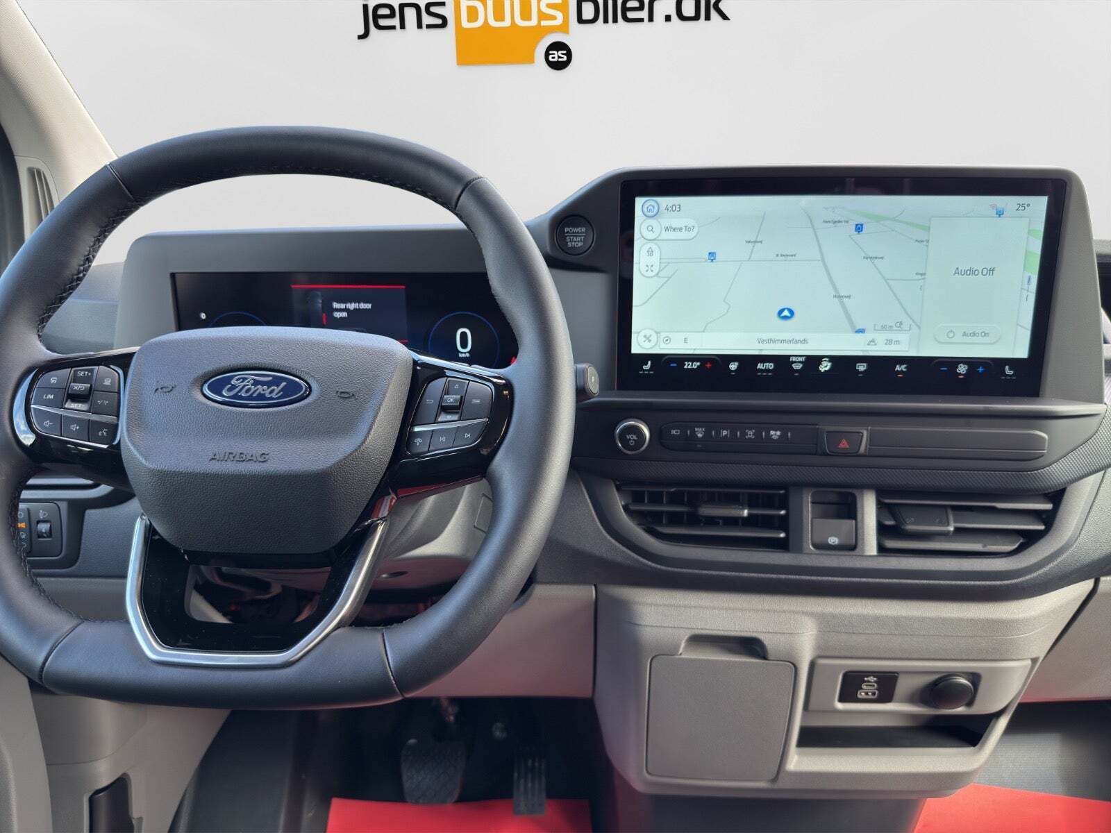 Grå Ford Transit Custom Kombi 340L fra 2024 set indefra