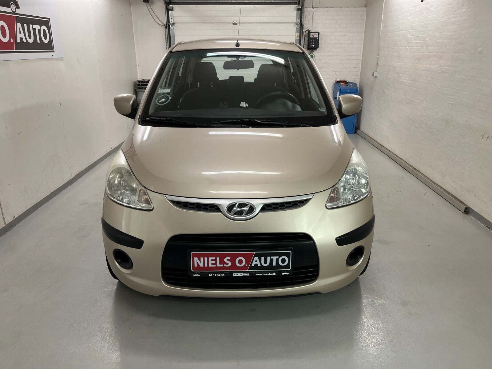 Orange Hyundai i10 fra 2010