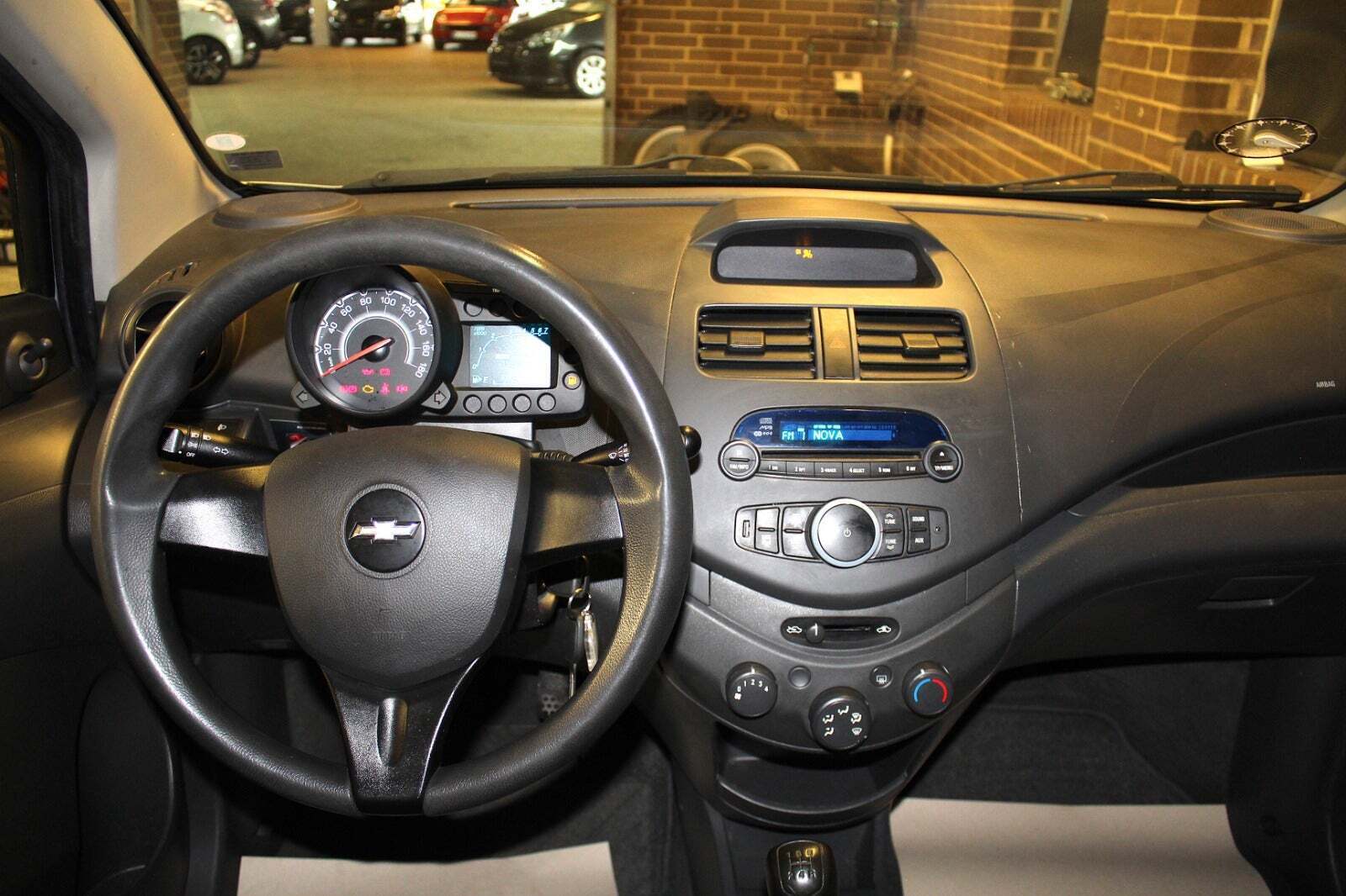 Sølv Chevrolet Spark fra 2012