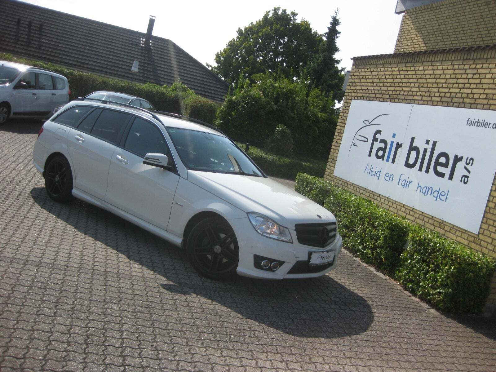Hvid Mercedes C200 fra 2011