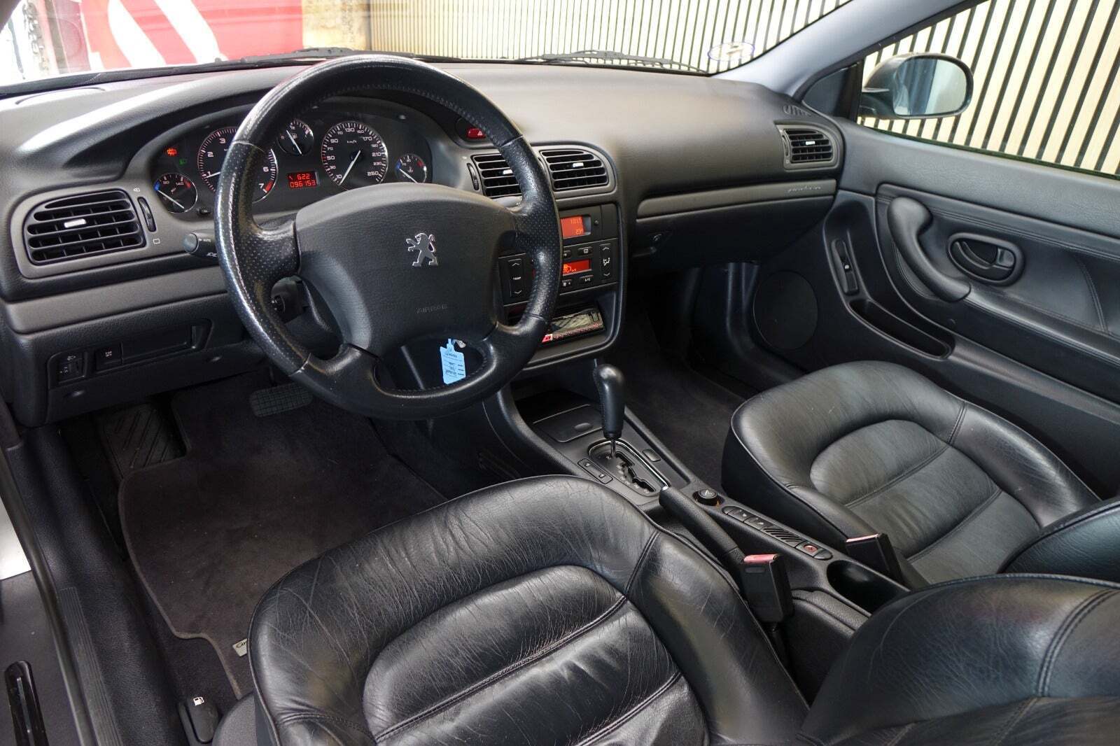 Sølv Peugeot 406 fra 2003