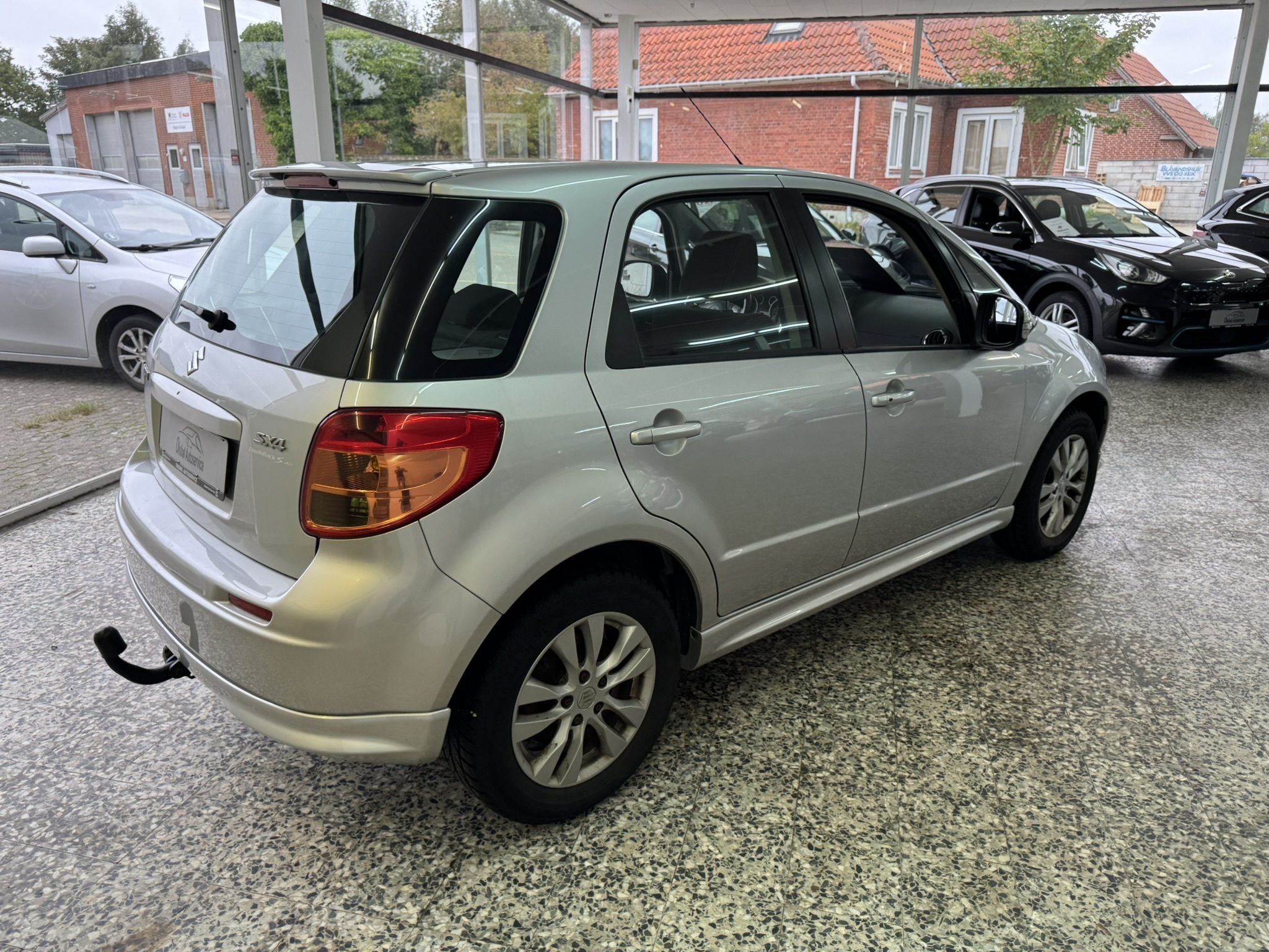 Grå Suzuki SX4 fra 2014