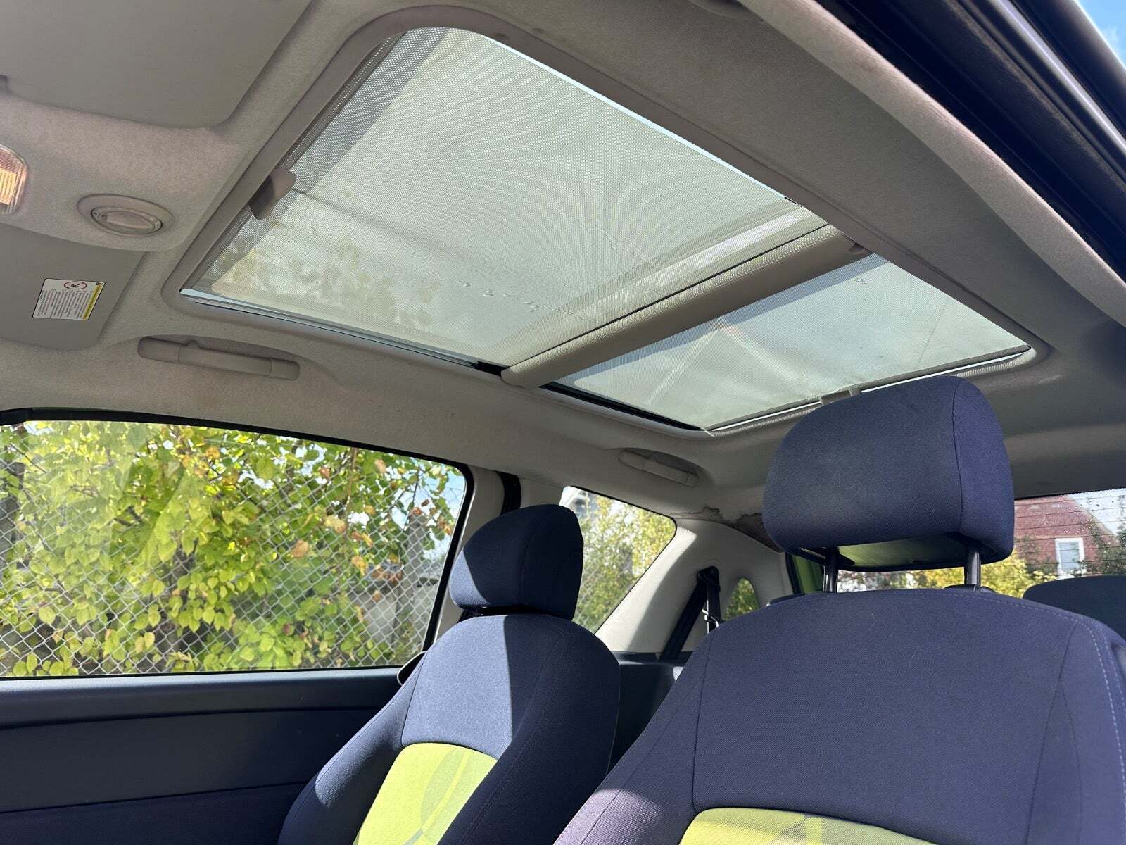 Grøn Peugeot 1007 fra 2005